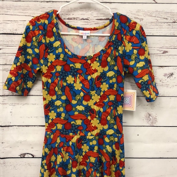 LuLaRoe Dresses & Skirts - LulaRoe bright‎ feather ornament print Nicole dress